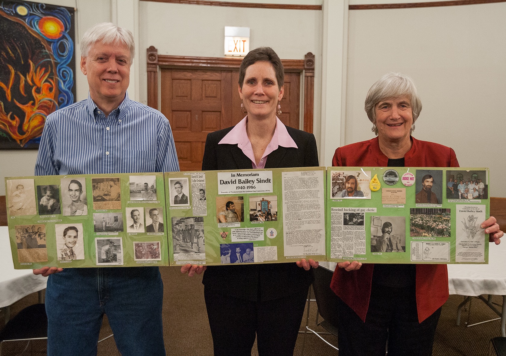 Barry Smith, Rev. Beth Brown, and Rev. Janie Spahr in 2014 holding up the David Sindt Collage that was created by Barry Smith. The collage is housed in the archives of Lincoln Park Presbyterian Church in Chicago. Photograph courtesy of Barry Smith.