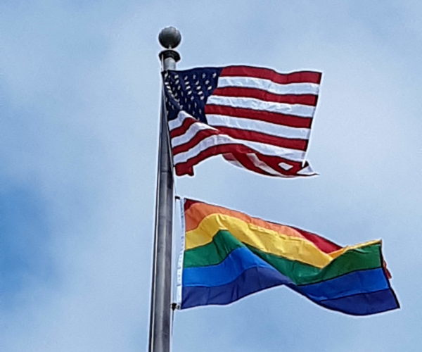 Pride flag flying over City Hall in Daly City in 2020